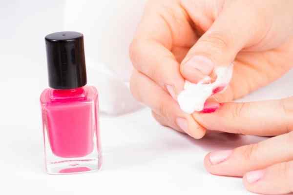 nail polish remover being used by a lady